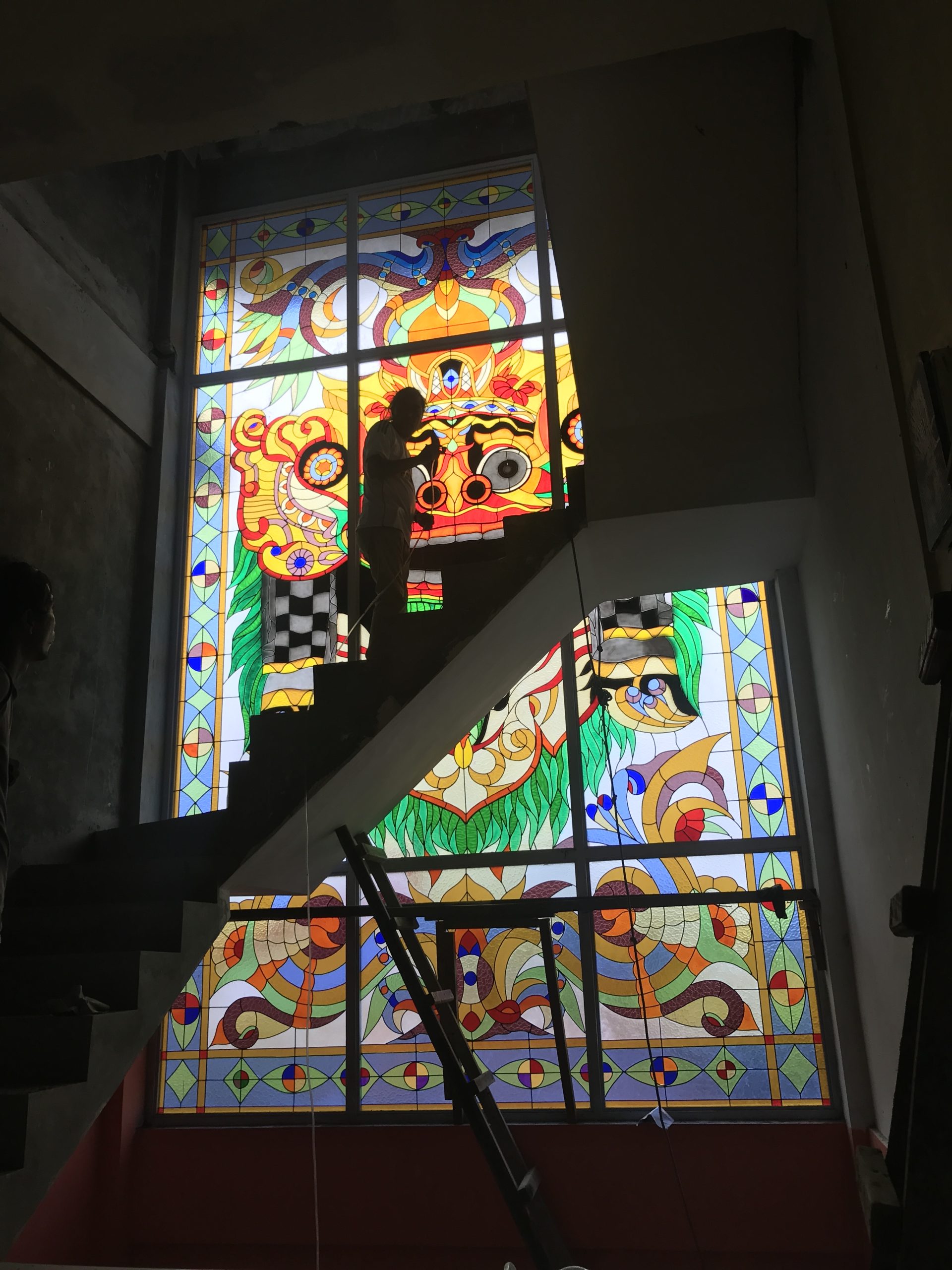 Installation of Barong stained glass windows at Lex Santoso's museum