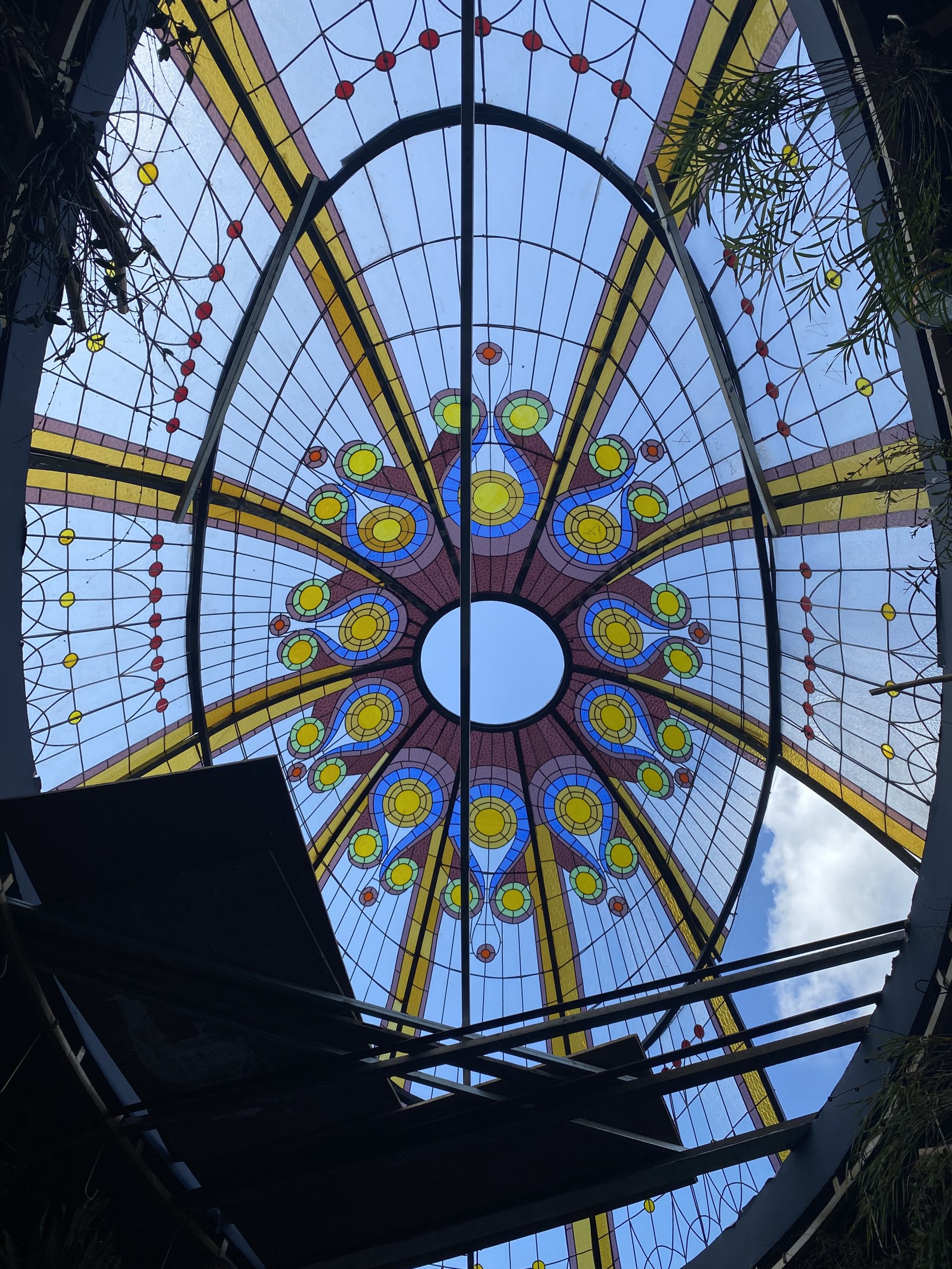 Overview of Merlin's Magic restaurant with stained glass features in Ubud