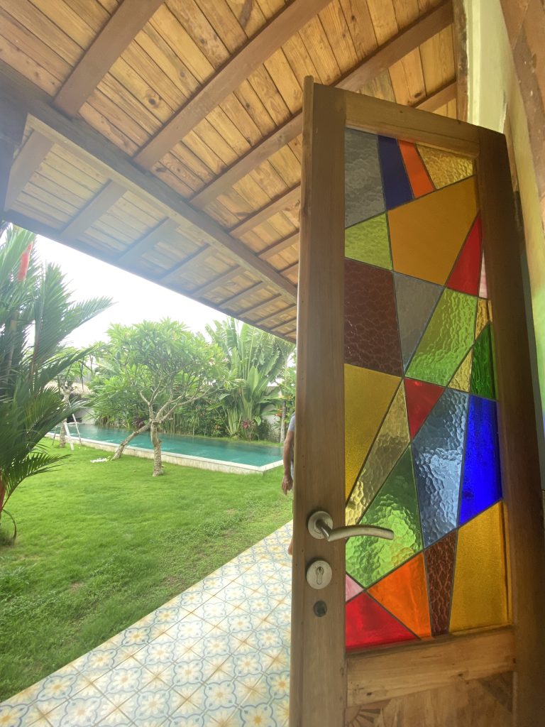 stained glass simple geometrical installation on door in vill on seminyak bali area