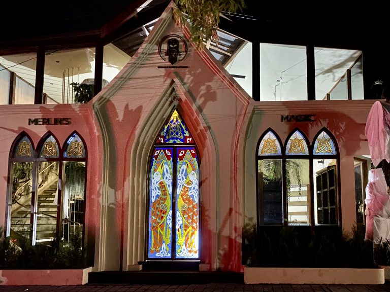 stained glass front view of merlin restaurant in ubud bali