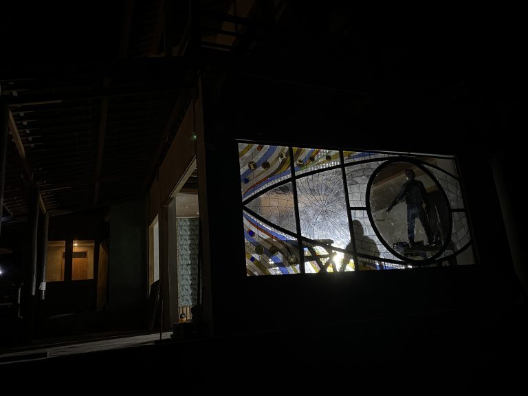 a midnight stained glass installation in singaraja, bali
