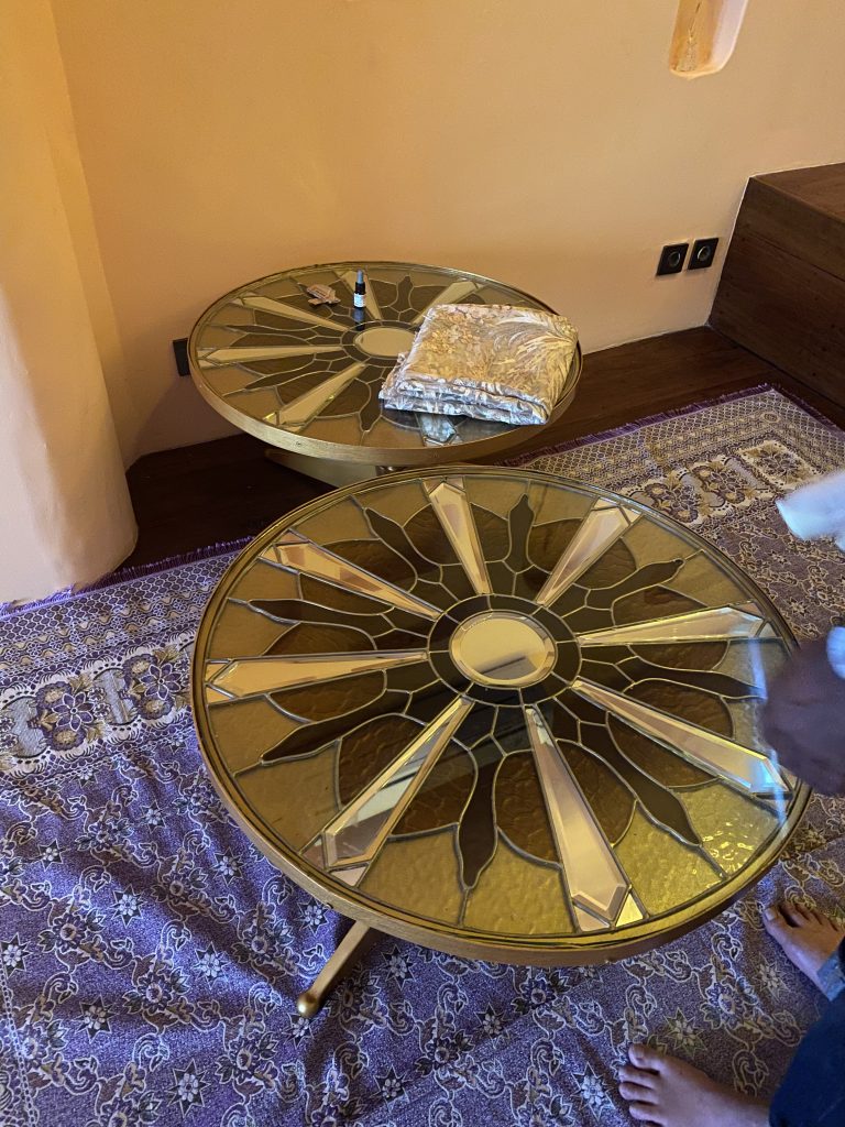 a vintage sample of a geometrical stained glass flat that can be installed on a small coffee table on a lounge, comissioned by merlin's , ubud, bali