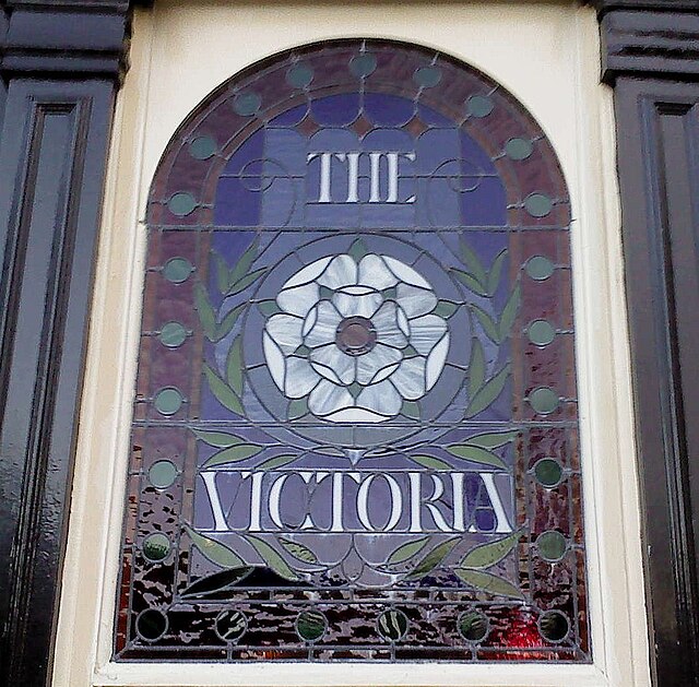 Victorian era stained glass with intricate floral motifs
