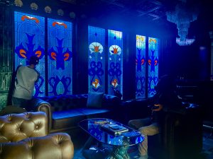 Stained glass create blue room coloured filter on dark lounge installed on kerobokan bali